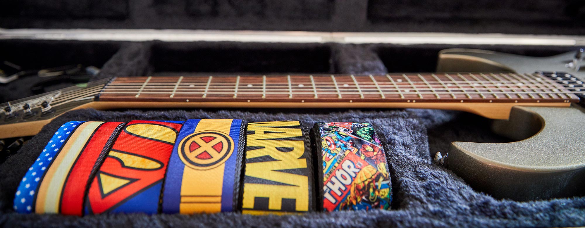 Banner Featuring Licensed Guitar Straps from Buckle-Down