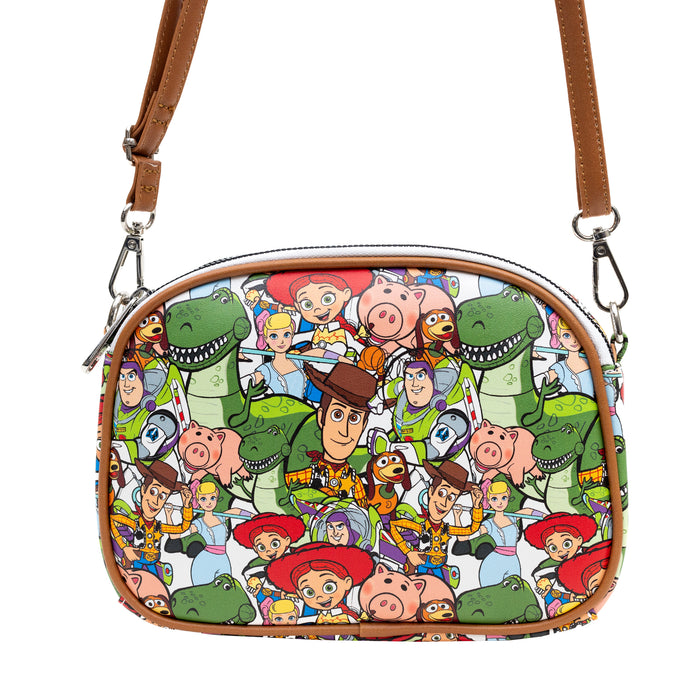 Disney Vegan Leather Crossbody bag with Adjustable Straps, Lilo & Stitch Stitch Close Up Lick Pose Applique, Blue, Toy Story Characters Stacked Multi Color, 8" x 7" Crossbody Bags Disney   